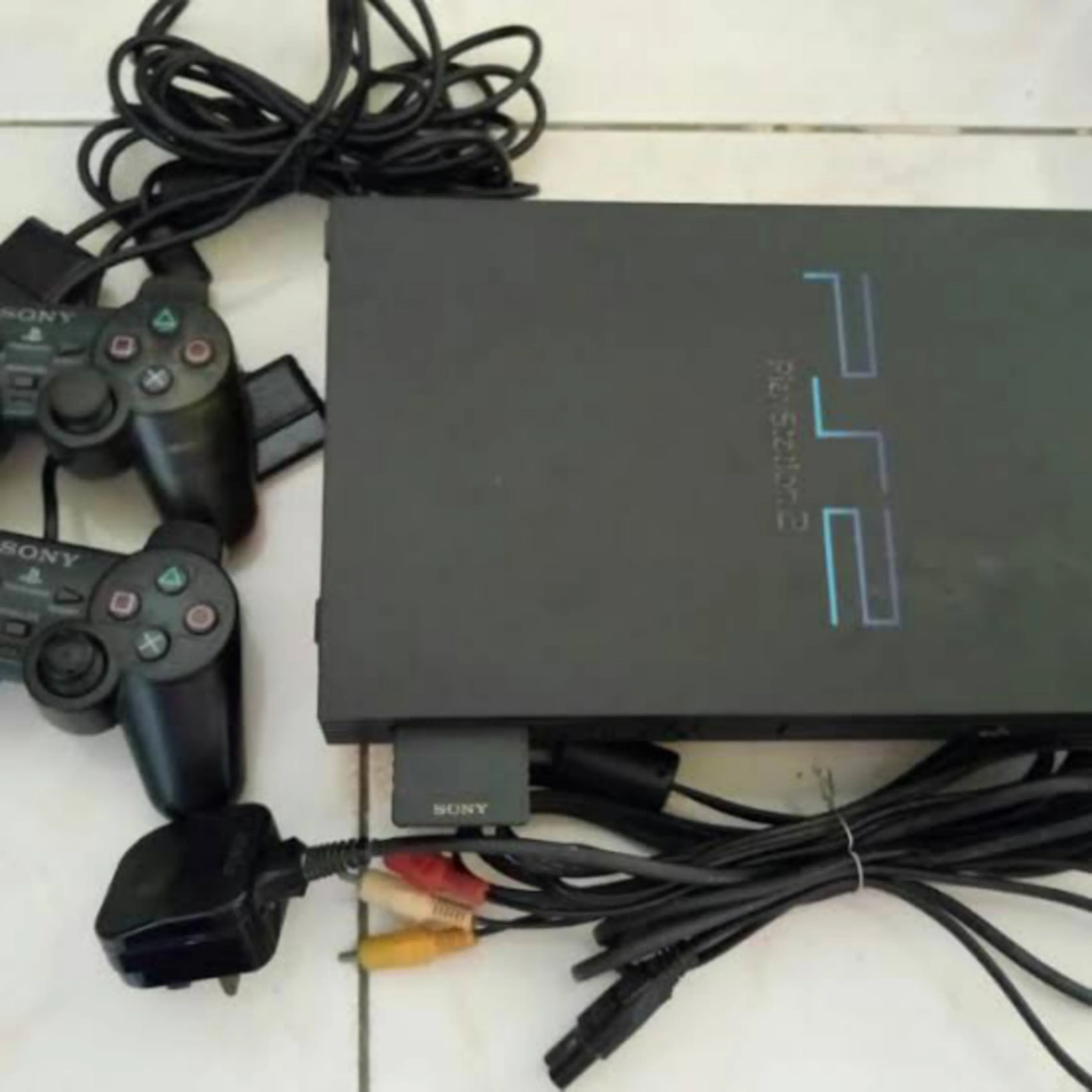 Sony Playstation 2 (PS2) Game Console Complete Set with 2 DUALSHOCK Wired Controllers & 10 Games - Foreign Used